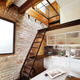 Illustration for article titled Theres an Entire House Crammed Into This Tiny 98-Year-Old Boiler Room